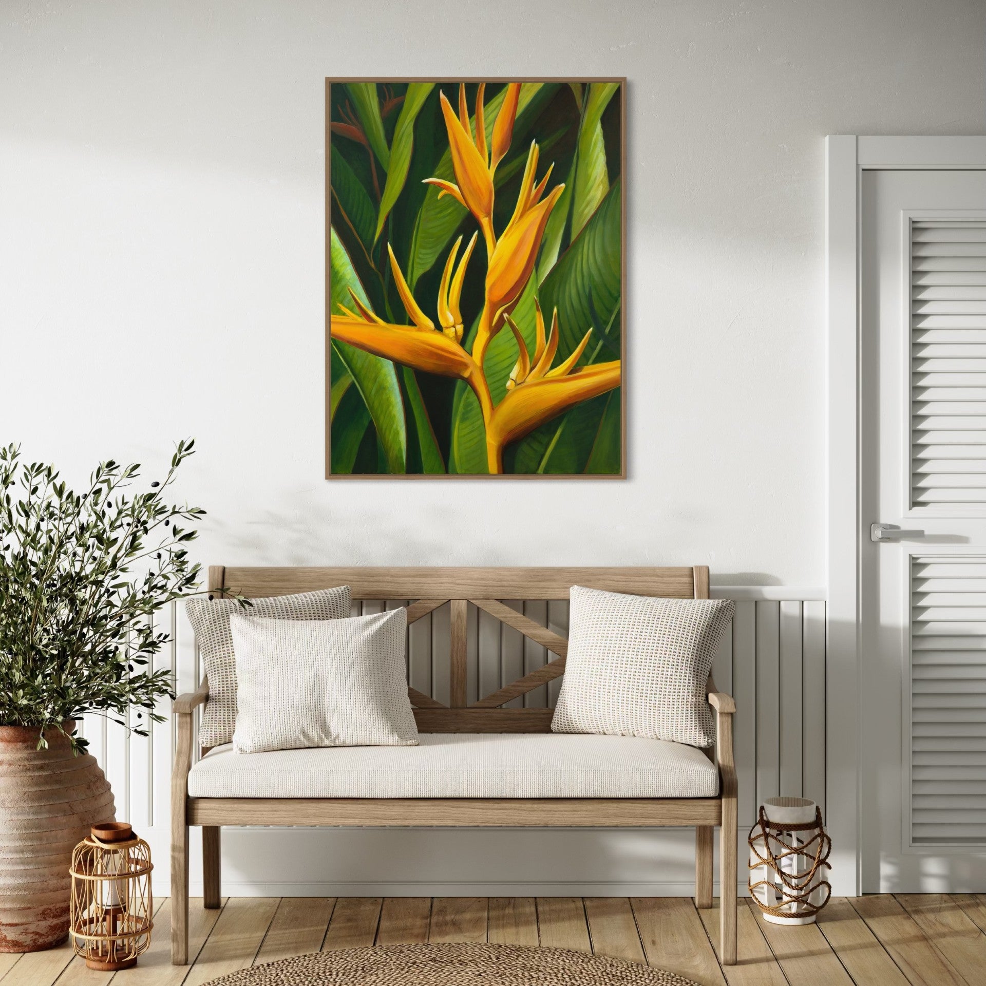 Decorative painting of tropical flowers above a wooden bench with white cushions in a room.