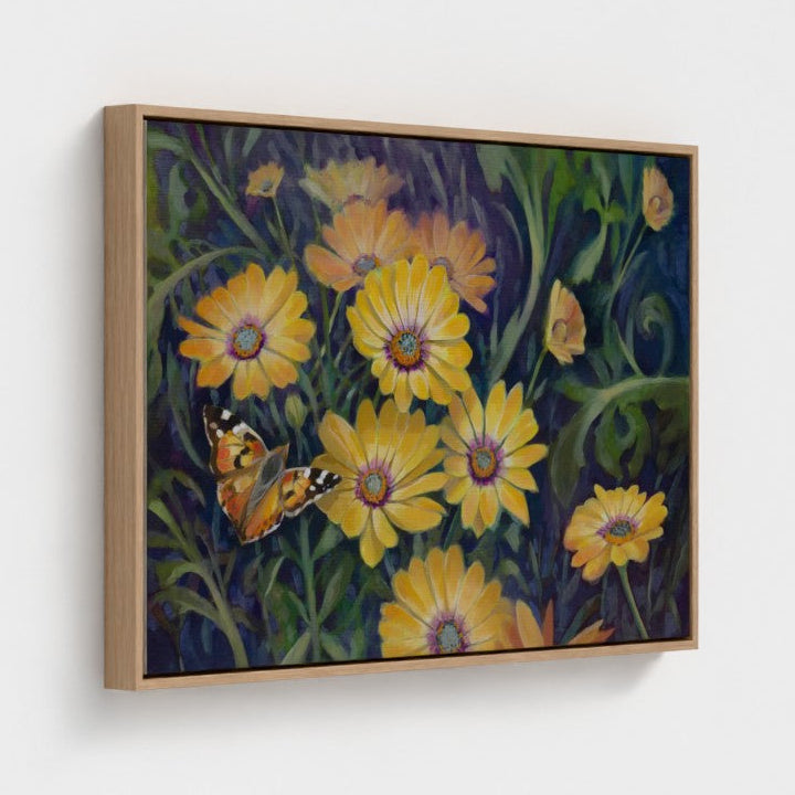 Framed painting of yellow flowers and a butterfly on a white wall